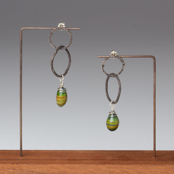 Dangle earrings with green glass beads