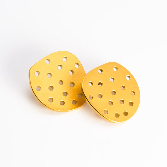 Perforated Circle Earrings in Gold Plated Steel. Sterling silver ear wires.